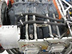 Hoses routed from oil cooler out the back of the doghouse baffling IMG_0042.JPG